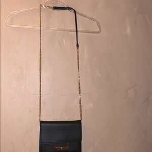 Unbranded black and gold chain small cross…